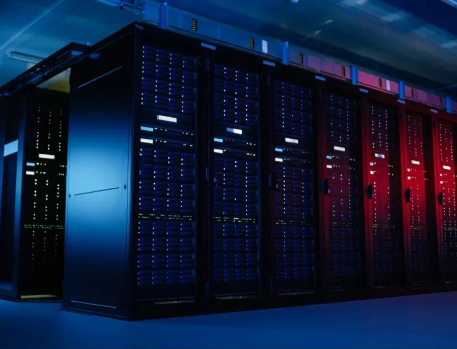 Exterior view of modular data center pods arranged side-by-side, with steel structure, doors, ventilation panels, and industrial surroundings.